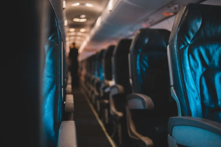 Rows of airplane cabin seats, illustrative photo